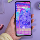 A photo of a person holding the OnePlus 10 Pro